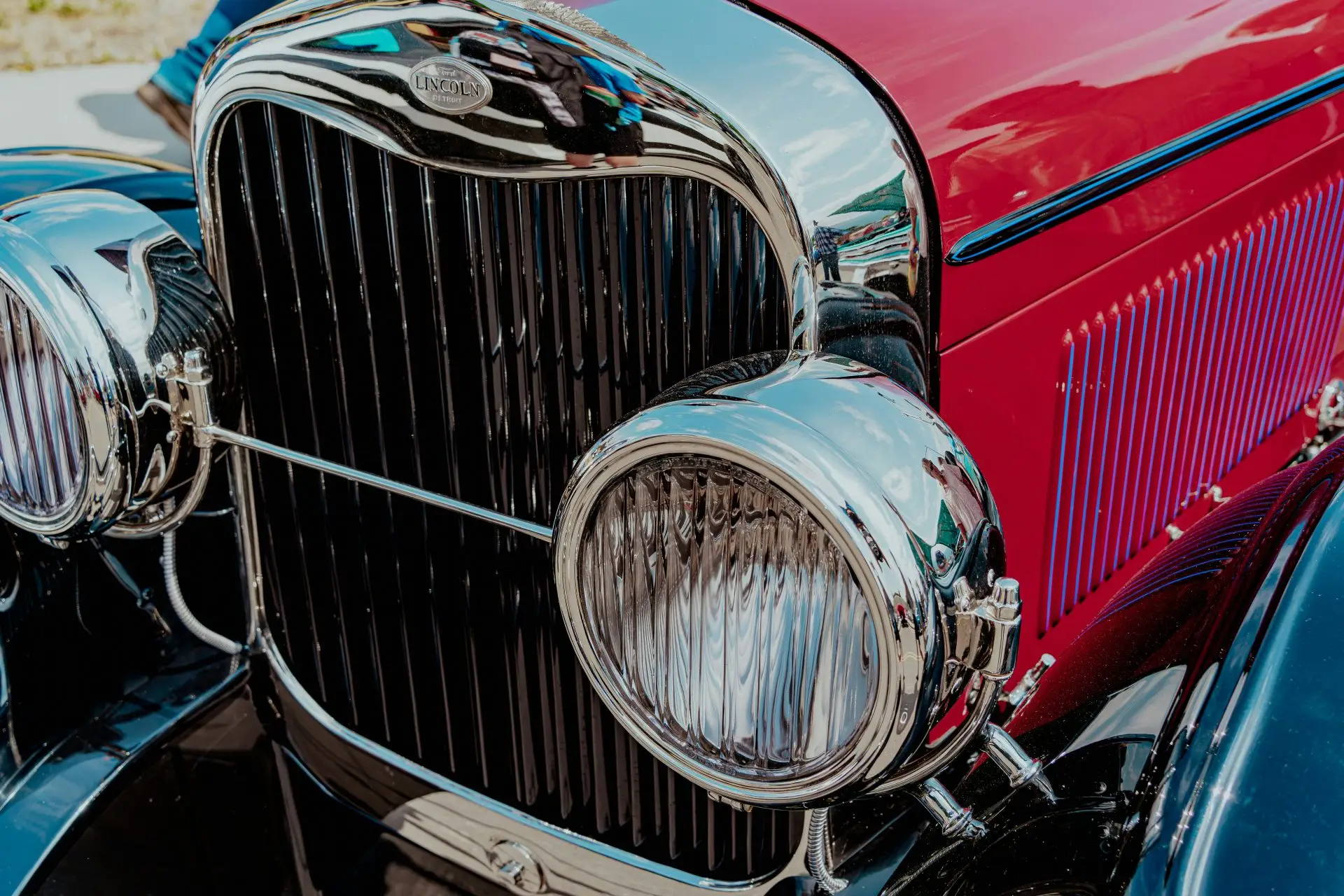 A close up of the front of a classic car