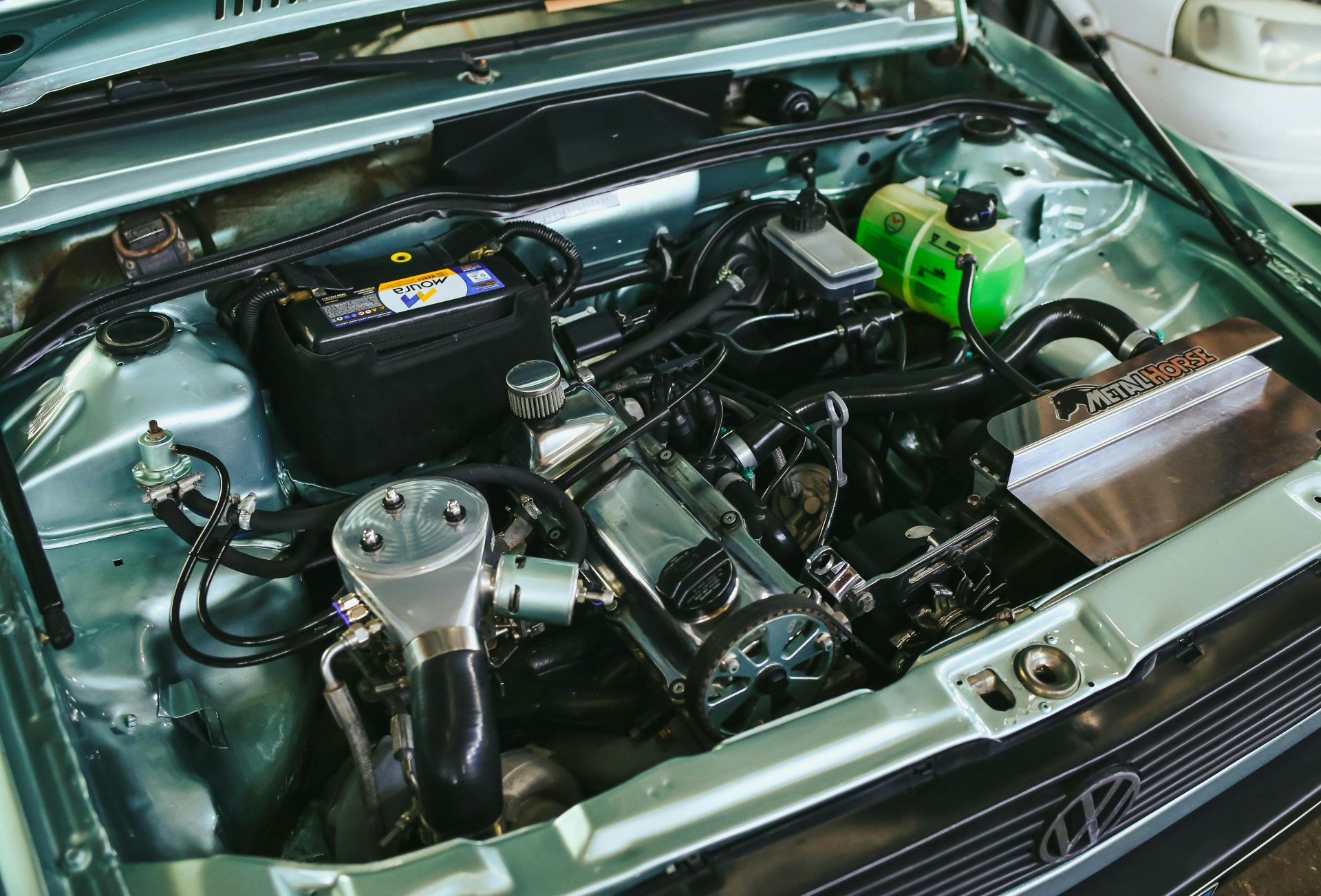 Close-up view of a car engine compartment